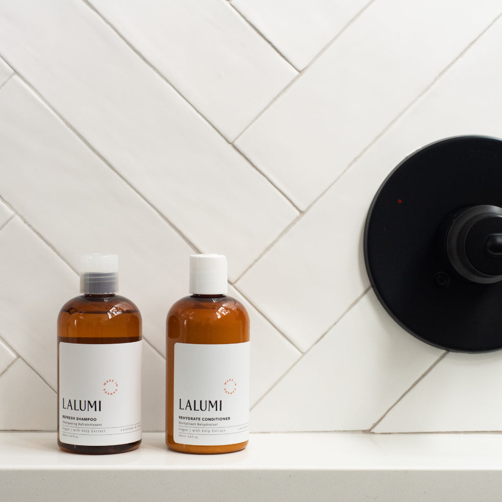 Image of Lalumi Refresh Shampoo and Lalumi Rehydrate Conditioner in Shower