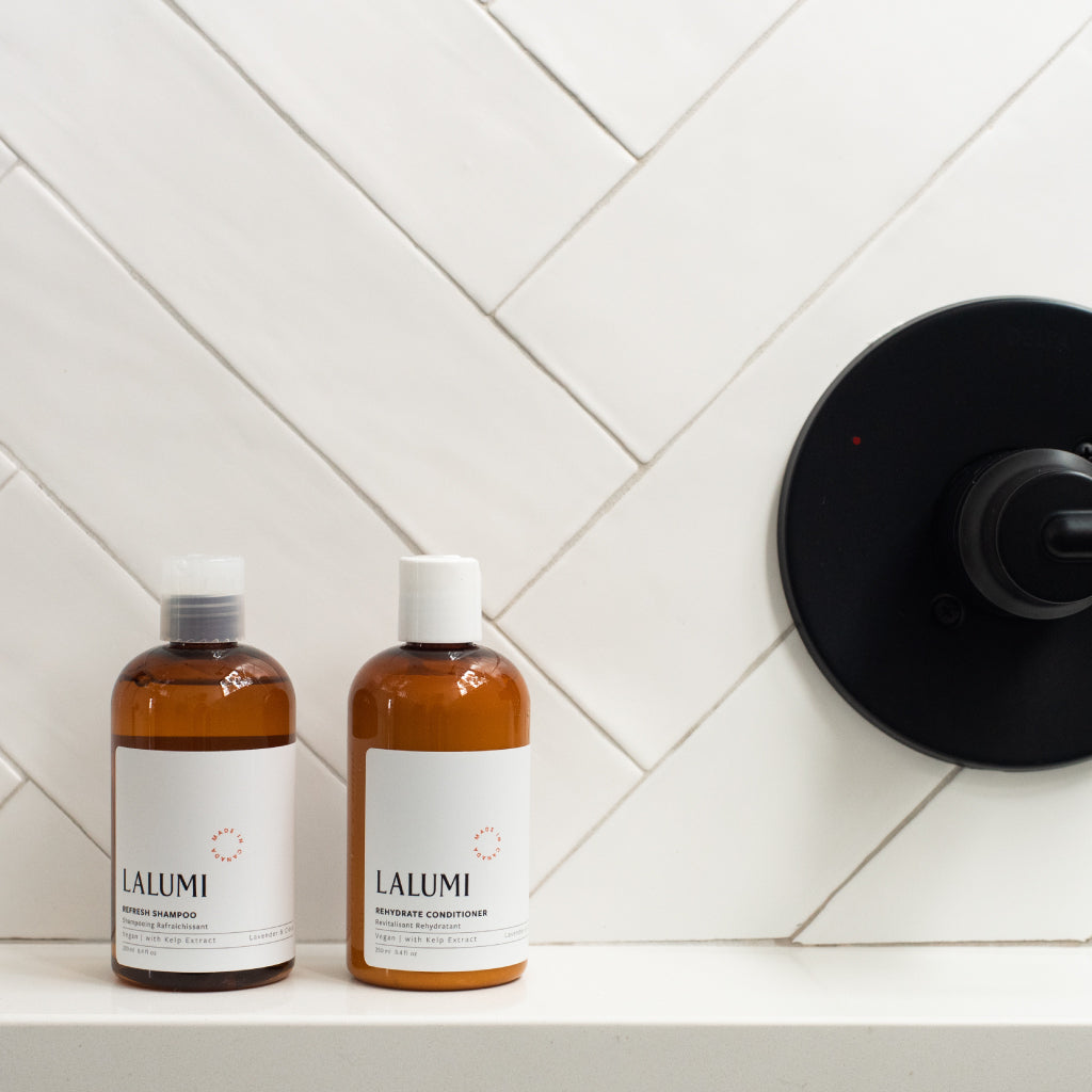 Image of Lalumi Refresh Shampoo and Lalumi Rehydrate Conditioner in Shower